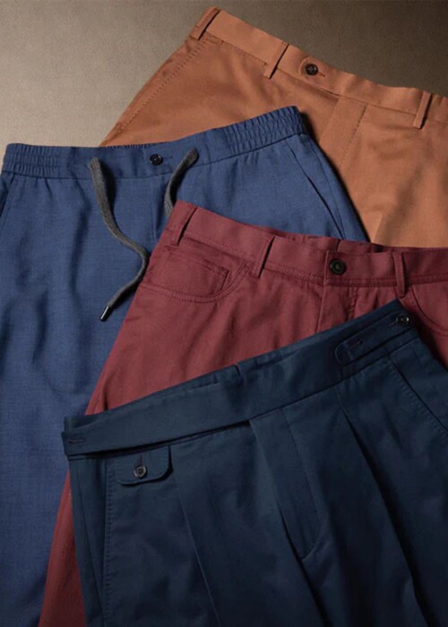 Scabal Hose in verschiedenen Farben Blau Rot und Beige mit hochwertigen Details und moderner Verarbeitung